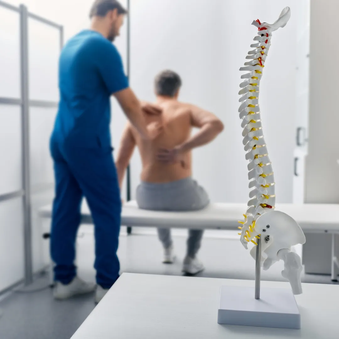 Patient with Back Pain seeing Lichfield Chiropractic Clinic